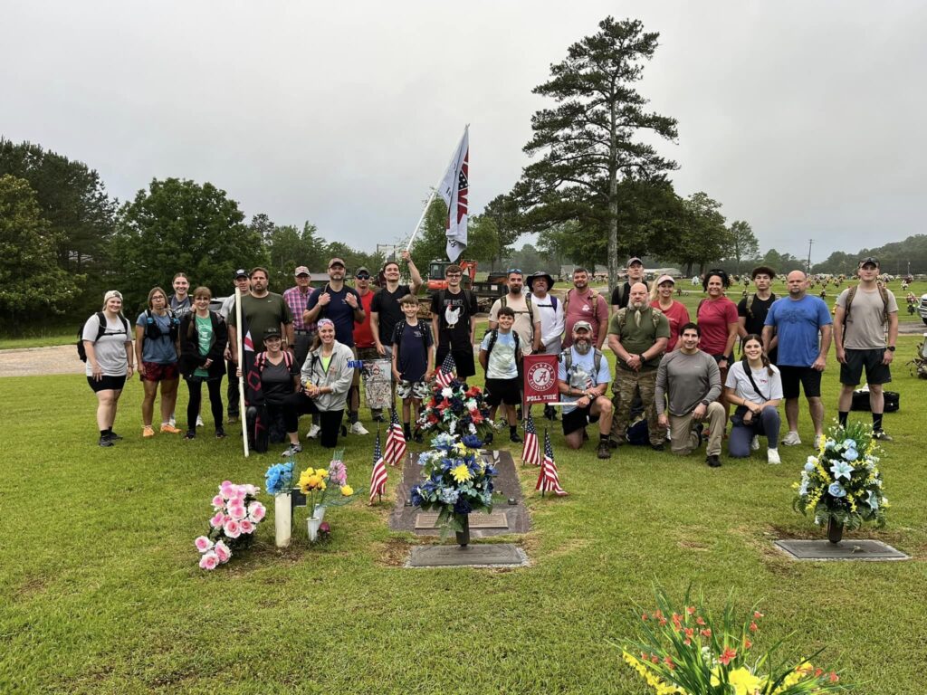 group rucking with weighted backpacks for community, fitness and honoring Mark Forester