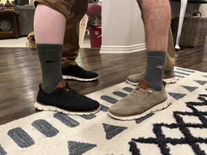 men wearing GORUCK Merino Challenge Socks at the office